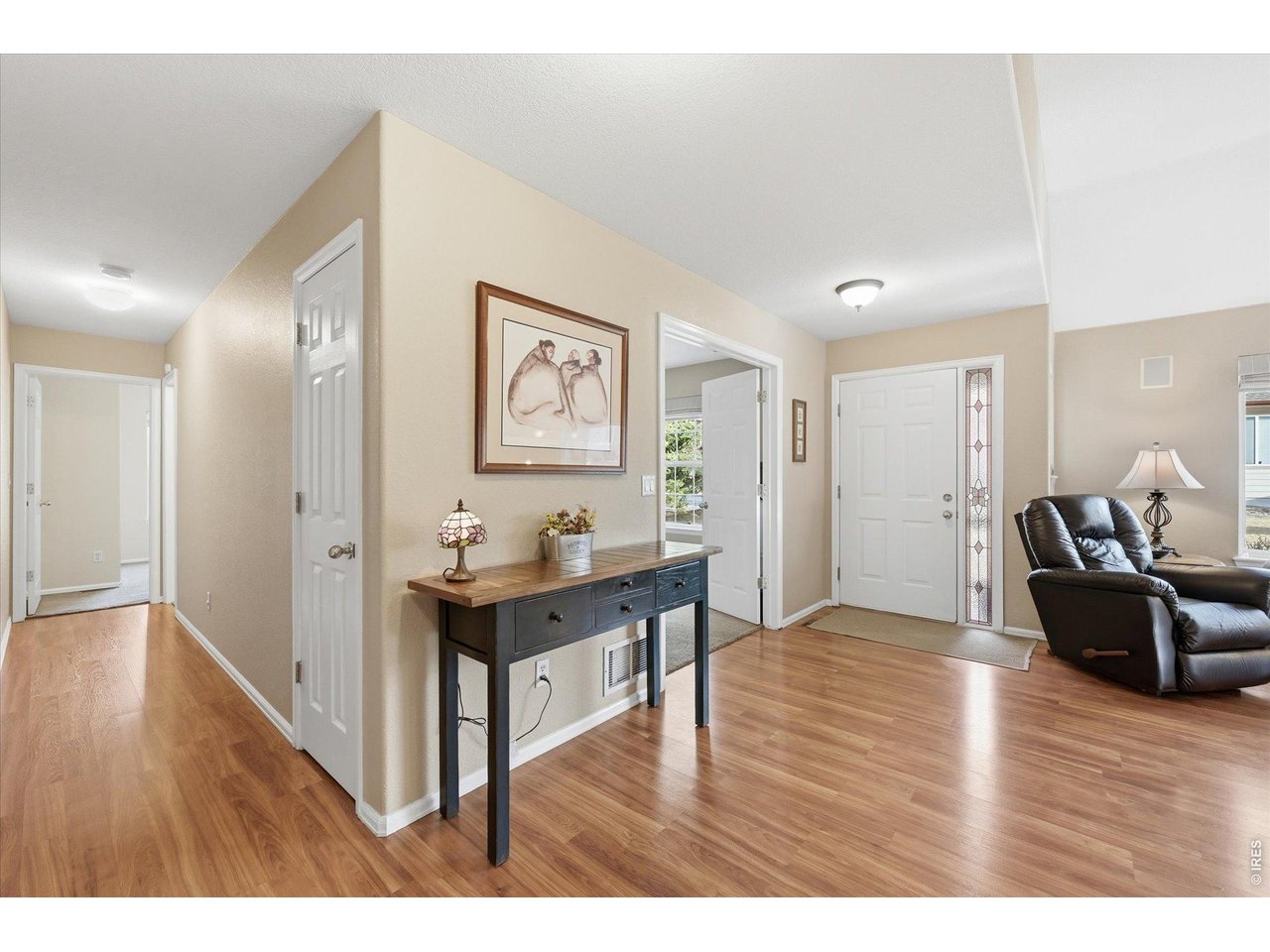 6227 Secrest Lane Arvada, CO 80403 - Photo 5 of 47 a workspace with furniture and wooden floor