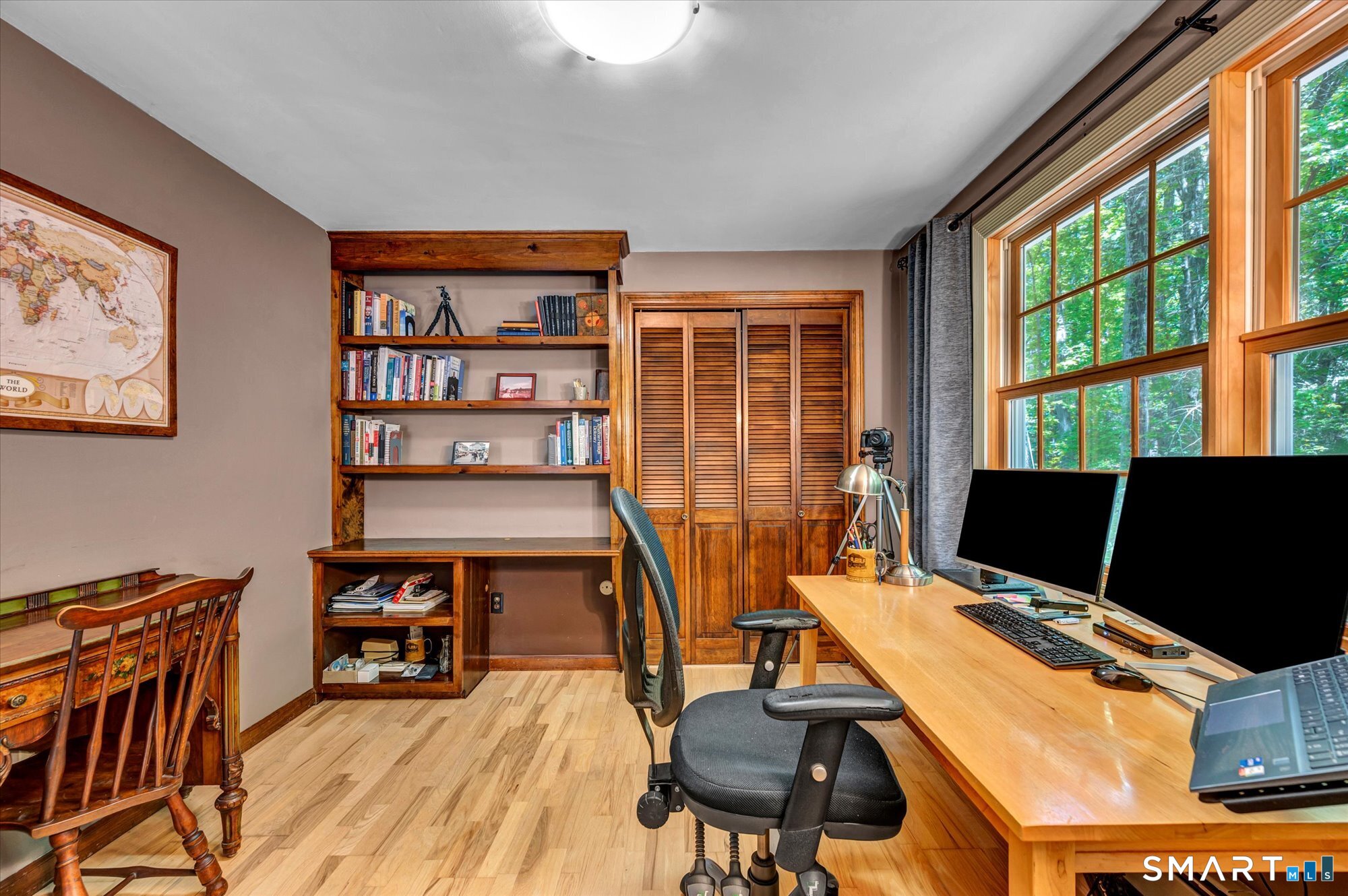59 Indian Hill Road Canton, CT 06019 - Photo 22 of 39 a view of a workspace with furniture and a window