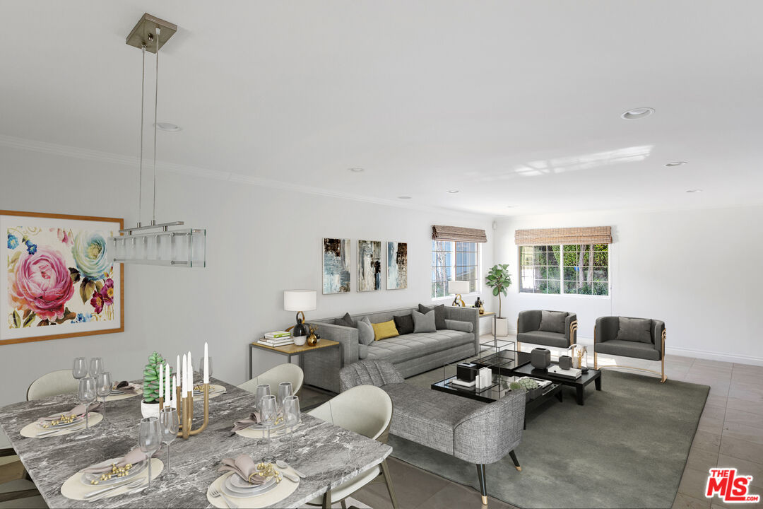 16636 Calneva Drive Encino, CA 91436 - Photo 5 of 18 a living room with furniture and a wooden floor