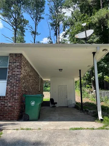 a view of a house with a street