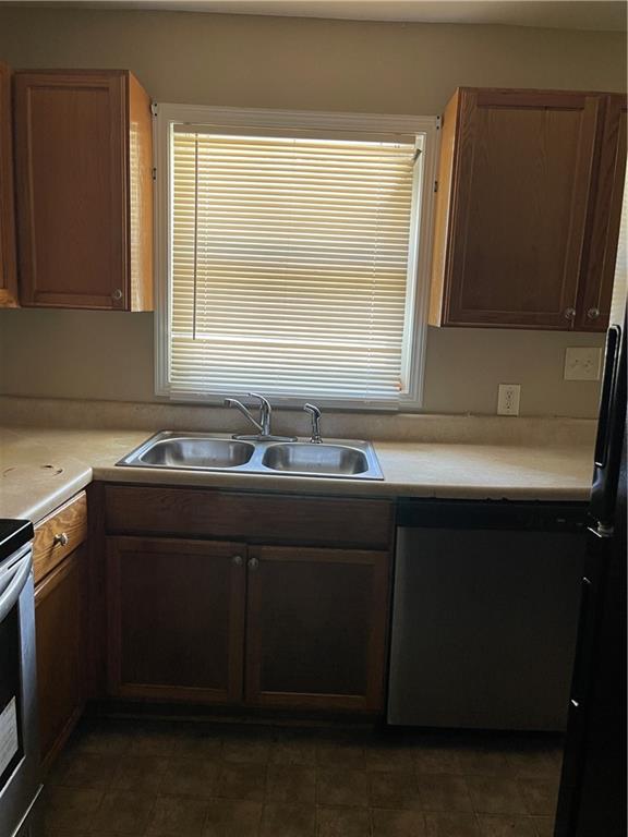 3692 Larkspur Terrace Decatur, GA 30032 - Photo 9 of 20 a sink sitting in a bathroom next to a window