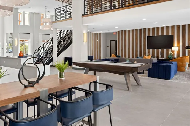 a view of a livingroom with furniture and window