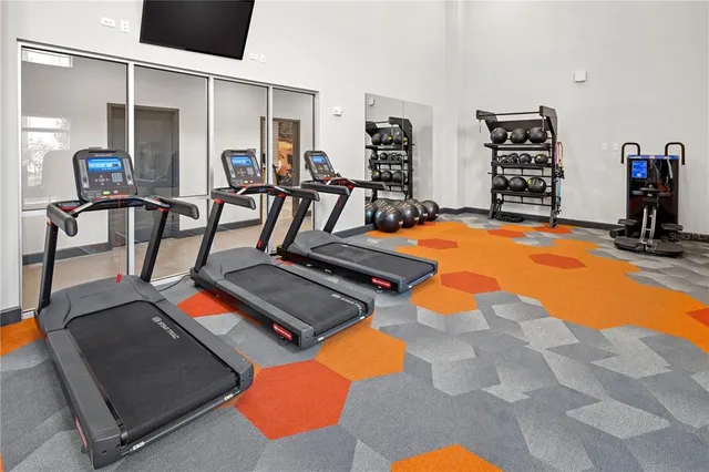 a view of a room with gym equipment