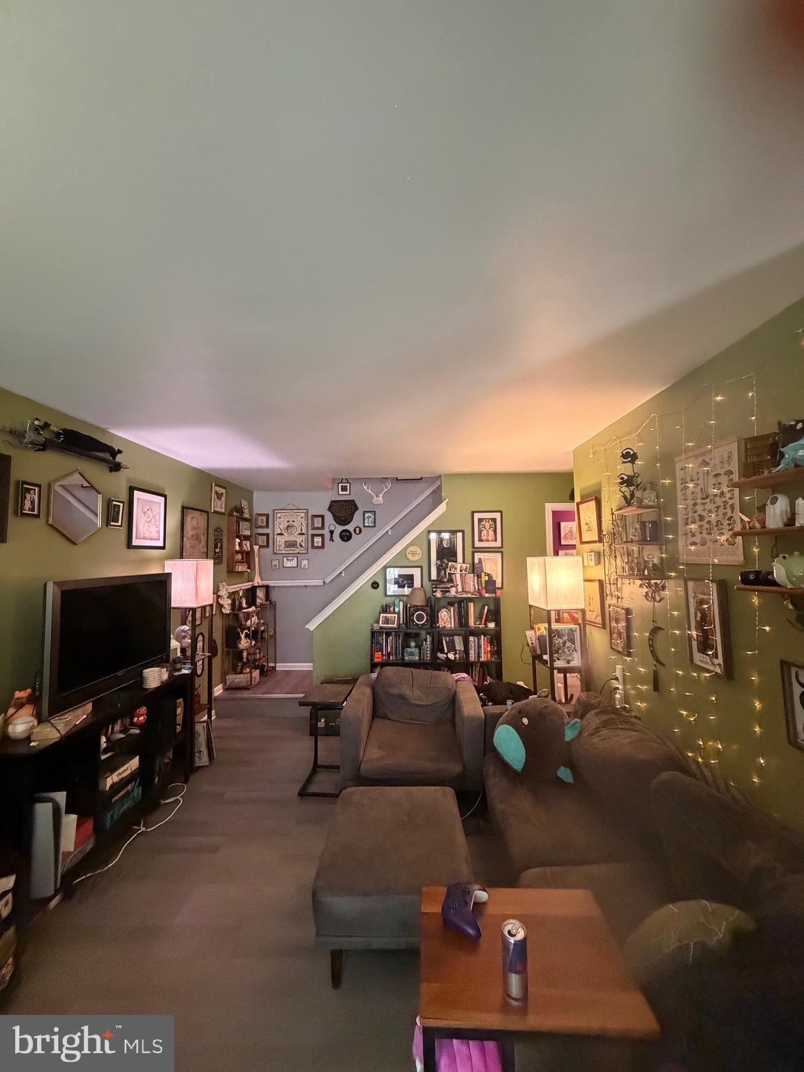 218 Highland Boulevard, Unit 67 New Castle, DE 19720 - Photo 11 of 12 a living room with furniture and a flat screen tv