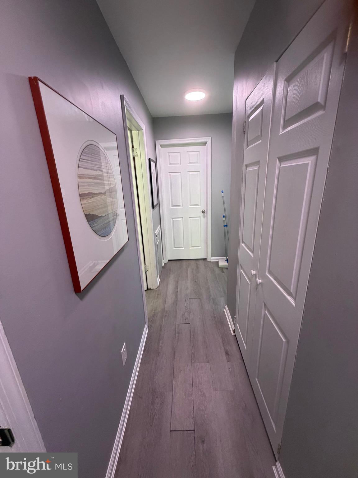 218 Highland Boulevard, Unit 67 New Castle, DE 19720 - Photo 4 of 12 a view of a hallway with wooden floor