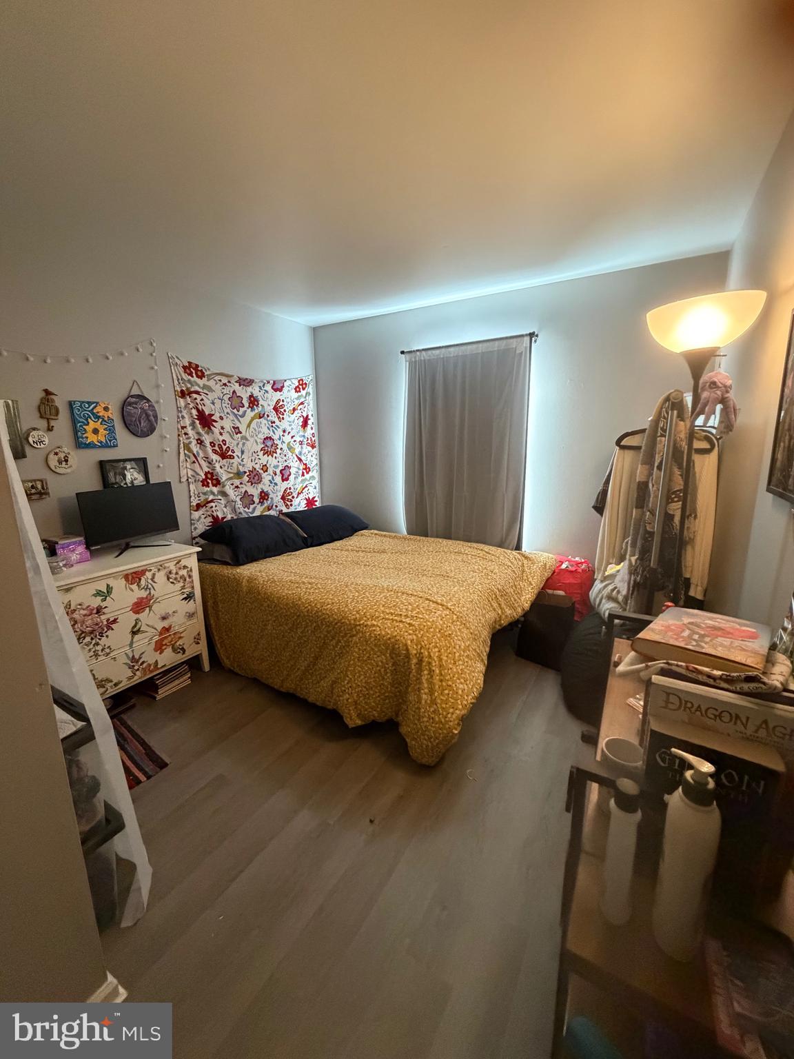 218 Highland Boulevard, Unit 67 New Castle, DE 19720 - Photo 6 of 12 a bedroom with a bed and a lamp