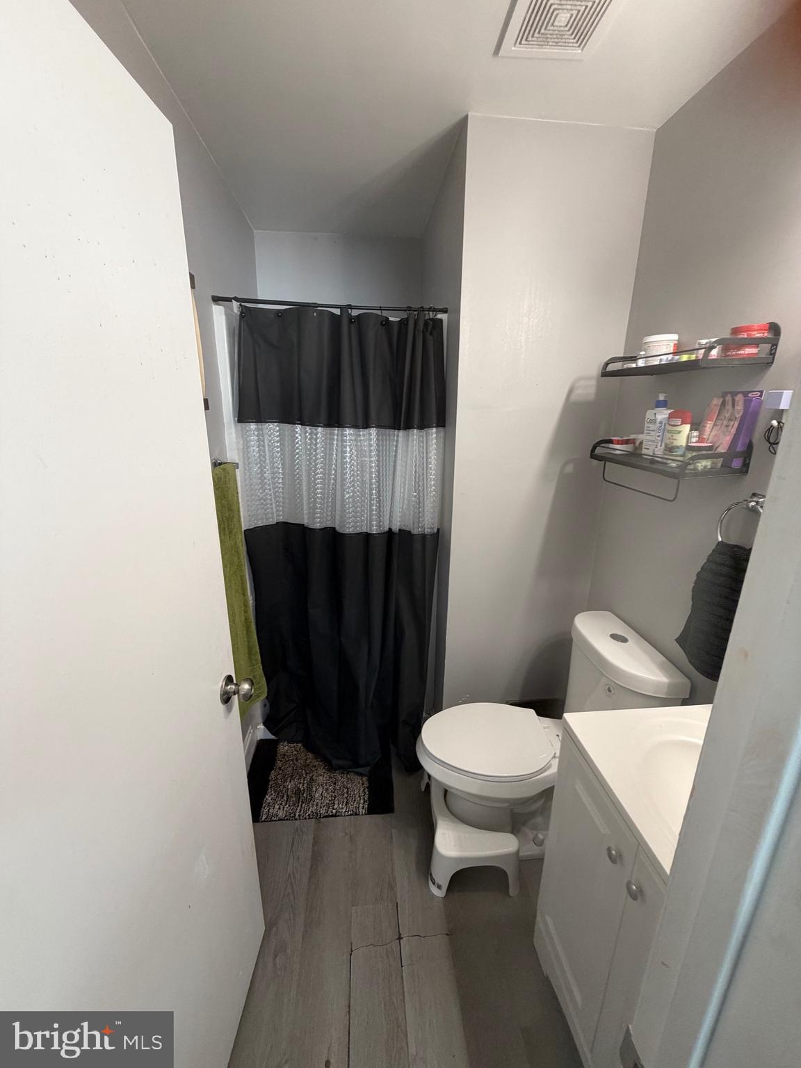 218 Highland Boulevard, Unit 67 New Castle, DE 19720 - Photo 8 of 12 a bathroom with a sink and a toilet