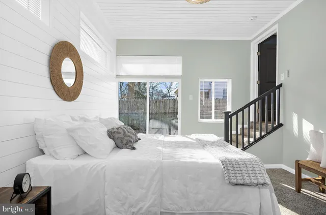 a view of small space with empty racks on the wall