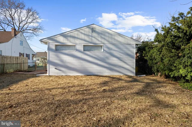 a view of backyard and tree