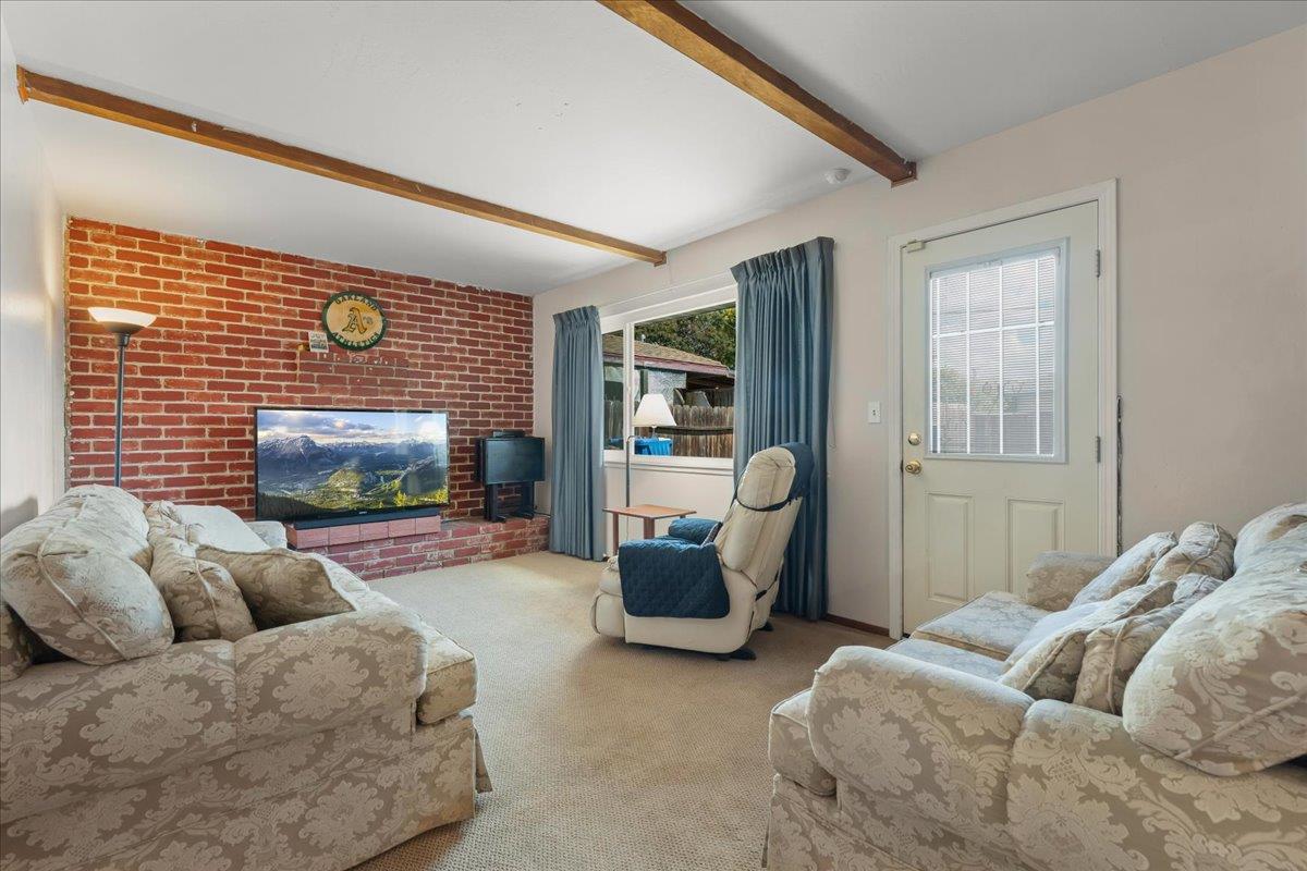 386 Heath Street Milpitas, CA 95035 - Photo 13 of 22 a bedroom with bed couch and window