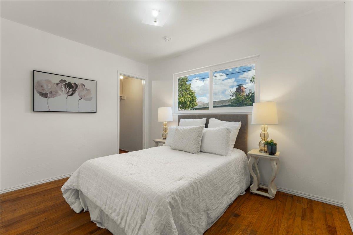 386 Heath Street Milpitas, CA 95035 - Photo 15 of 22 a bedroom with a bed and wooden floor