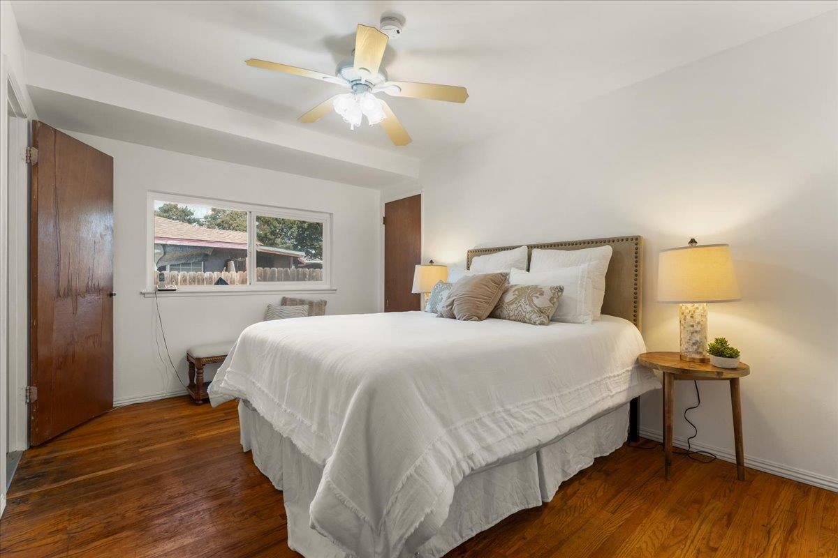386 Heath Street Milpitas, CA 95035 - Photo 16 of 22 a bedroom with a bed and wooden floor
