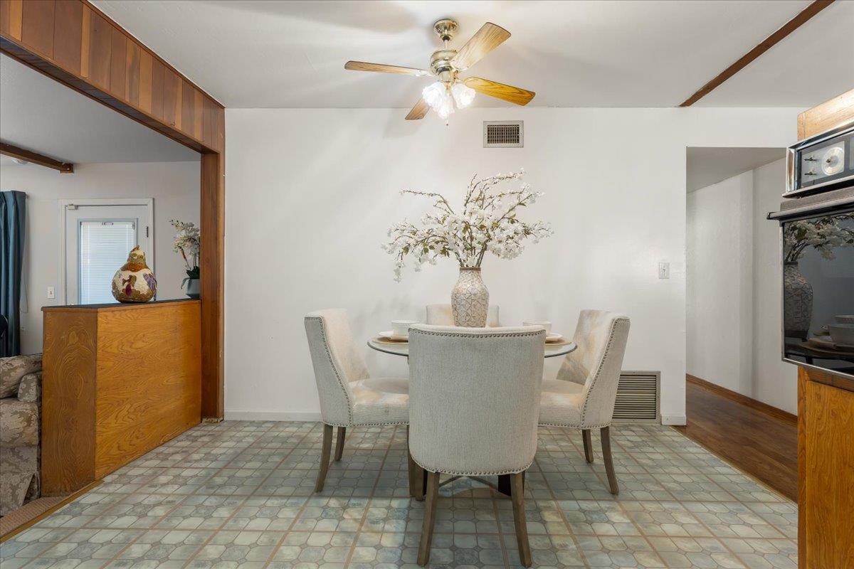 386 Heath Street Milpitas, CA 95035 - Photo 10 of 22 a view of a dining room with furniture and wooden floor