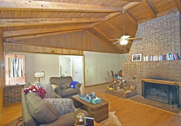 a house view with a sitting space and garden view