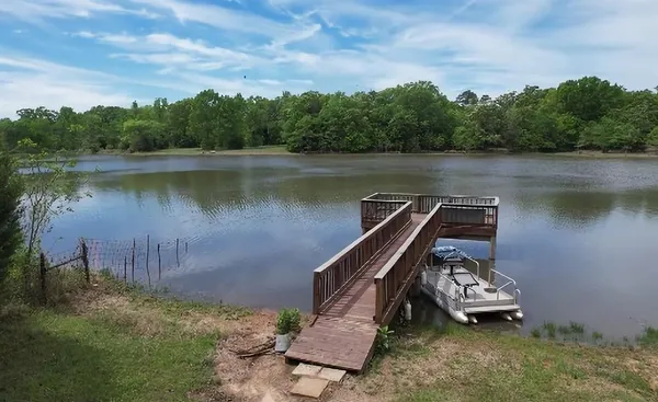 a view of a lake with outdoor space