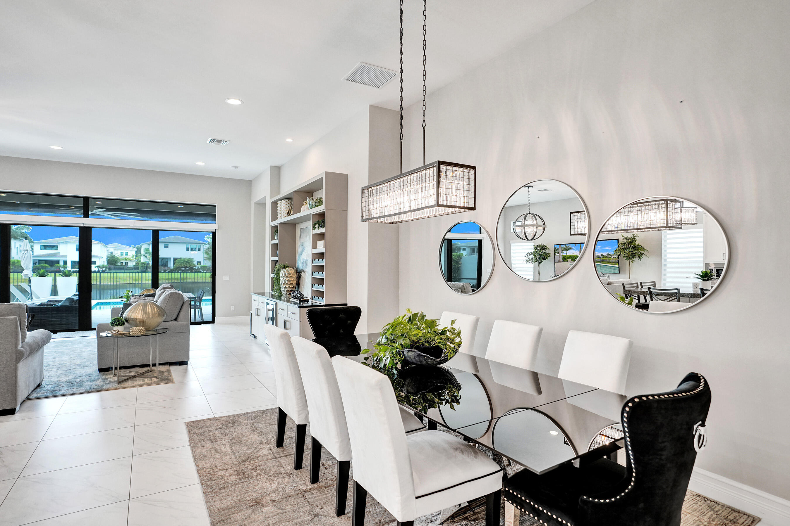 9052 Chauvet Way Boca Raton, FL 33496 - Photo 16 of 59 a living room with furniture flowerpot and window