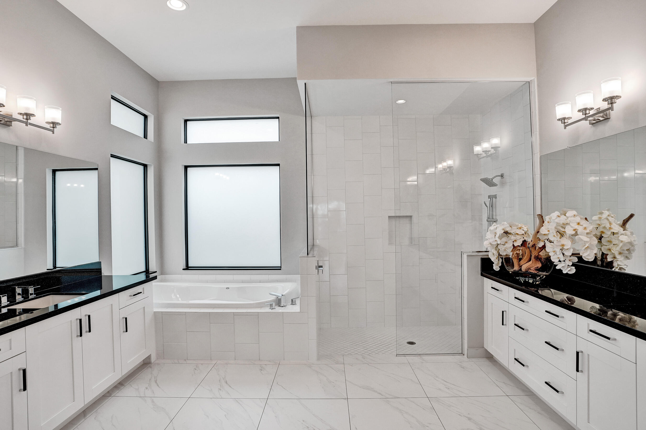 9052 Chauvet Way Boca Raton, FL 33496 - Photo 24 of 59 a bathroom with a double vanity sink and a mirror