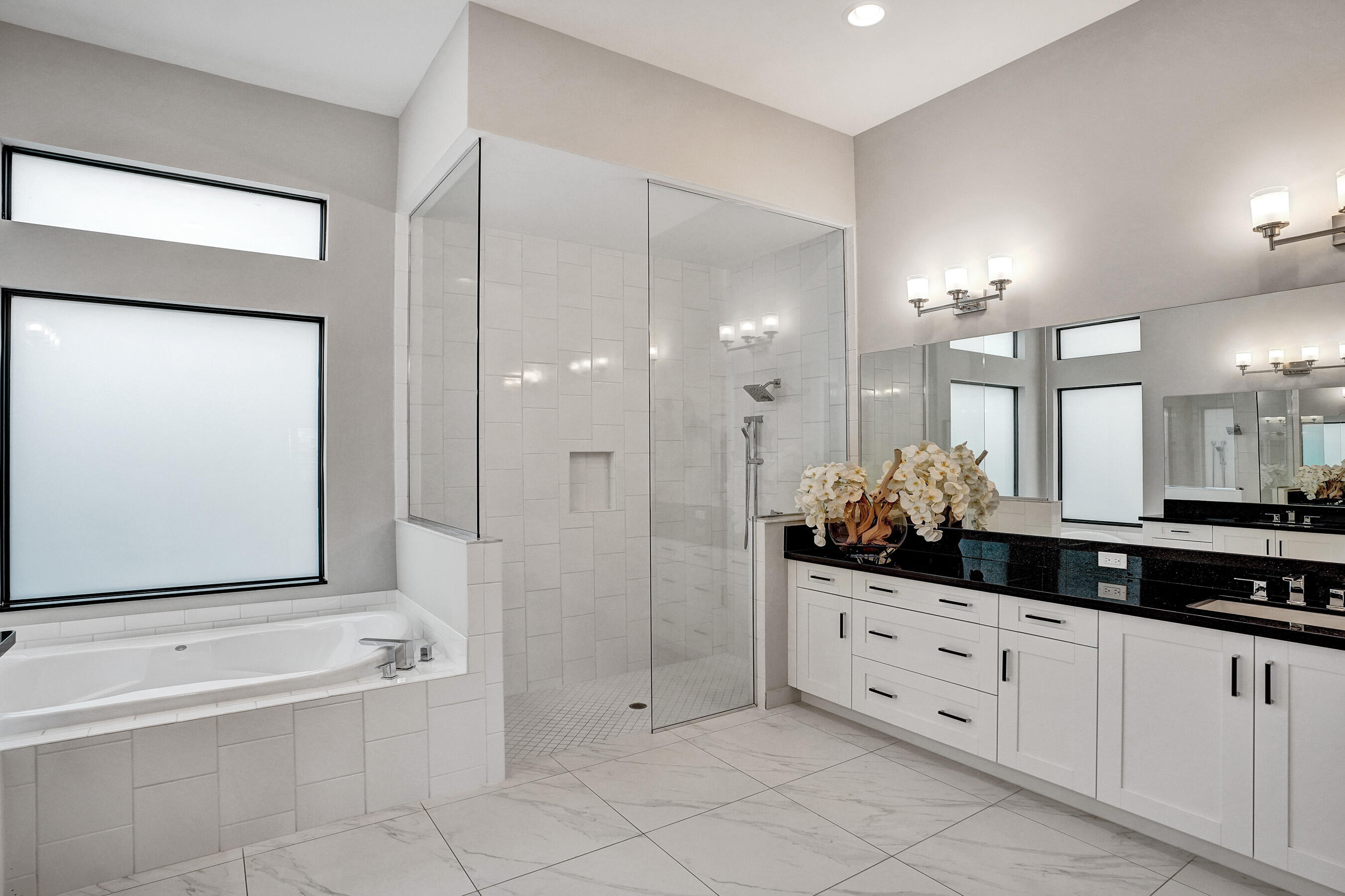 9052 Chauvet Way Boca Raton, FL 33496 - Photo 25 of 59 a bathroom with a granite countertop sink mirror and bathtub