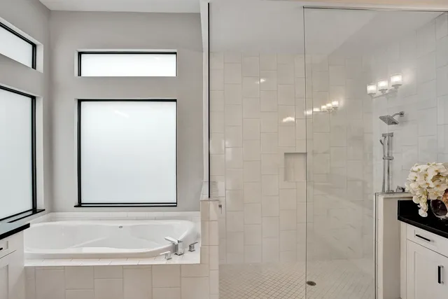 a bedroom with a bed and a table with closet