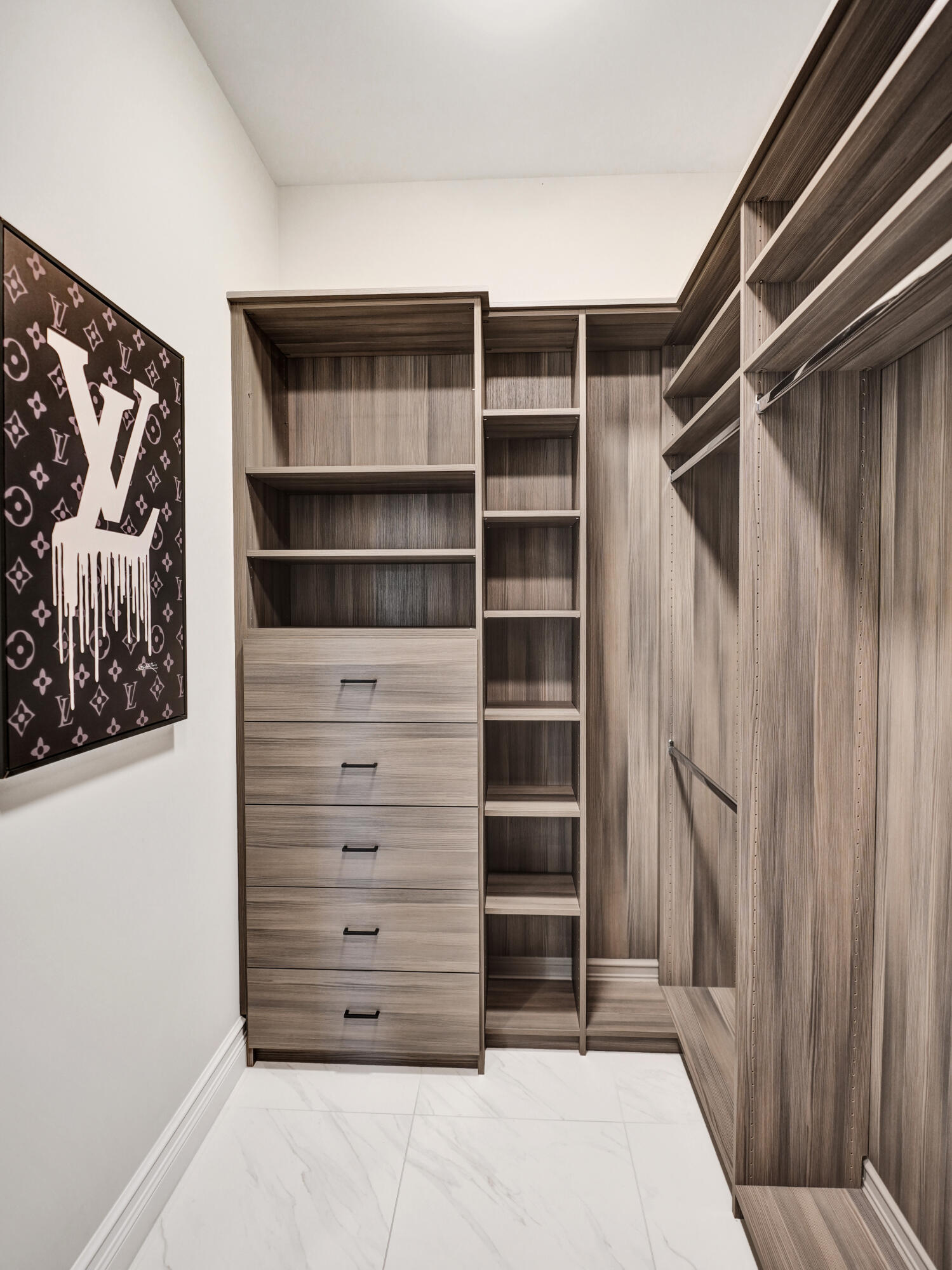 9052 Chauvet Way Boca Raton, FL 33496 - Photo 30 of 59 a view of walk in closet with empty racks