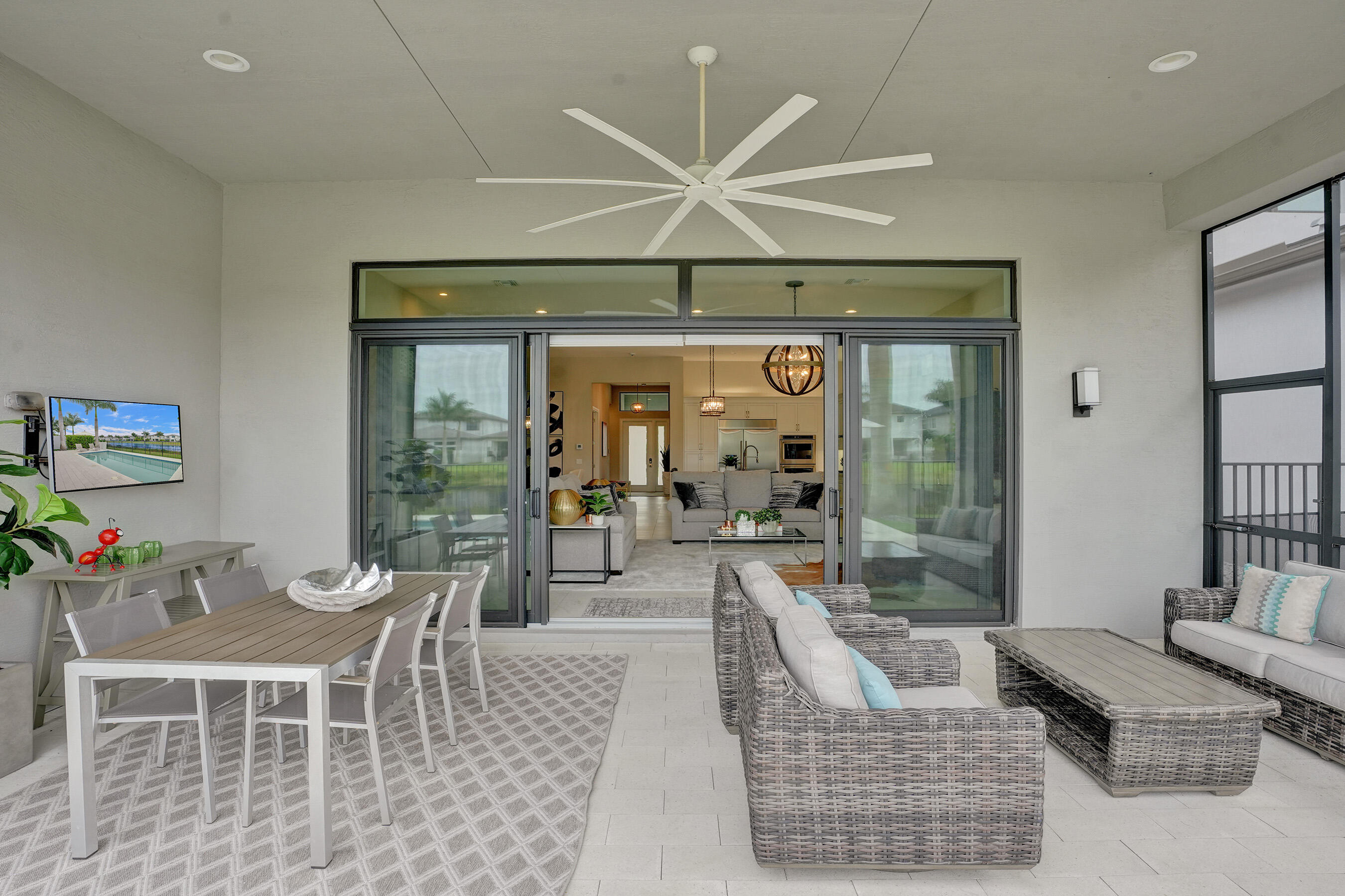 9052 Chauvet Way Boca Raton, FL 33496 - Photo 39 of 59 a living room with furniture and a large window