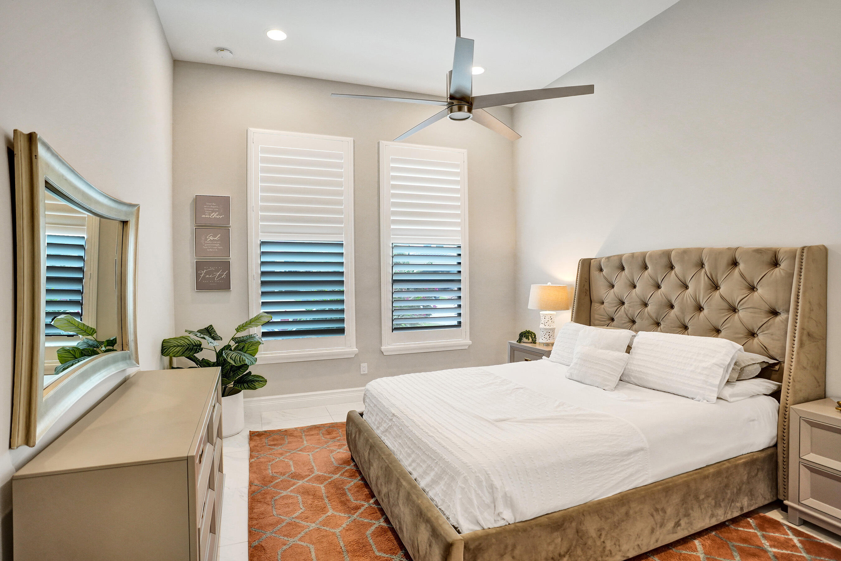 9052 Chauvet Way Boca Raton, FL 33496 - Photo 44 of 59 a bedroom with a large bed and a couch