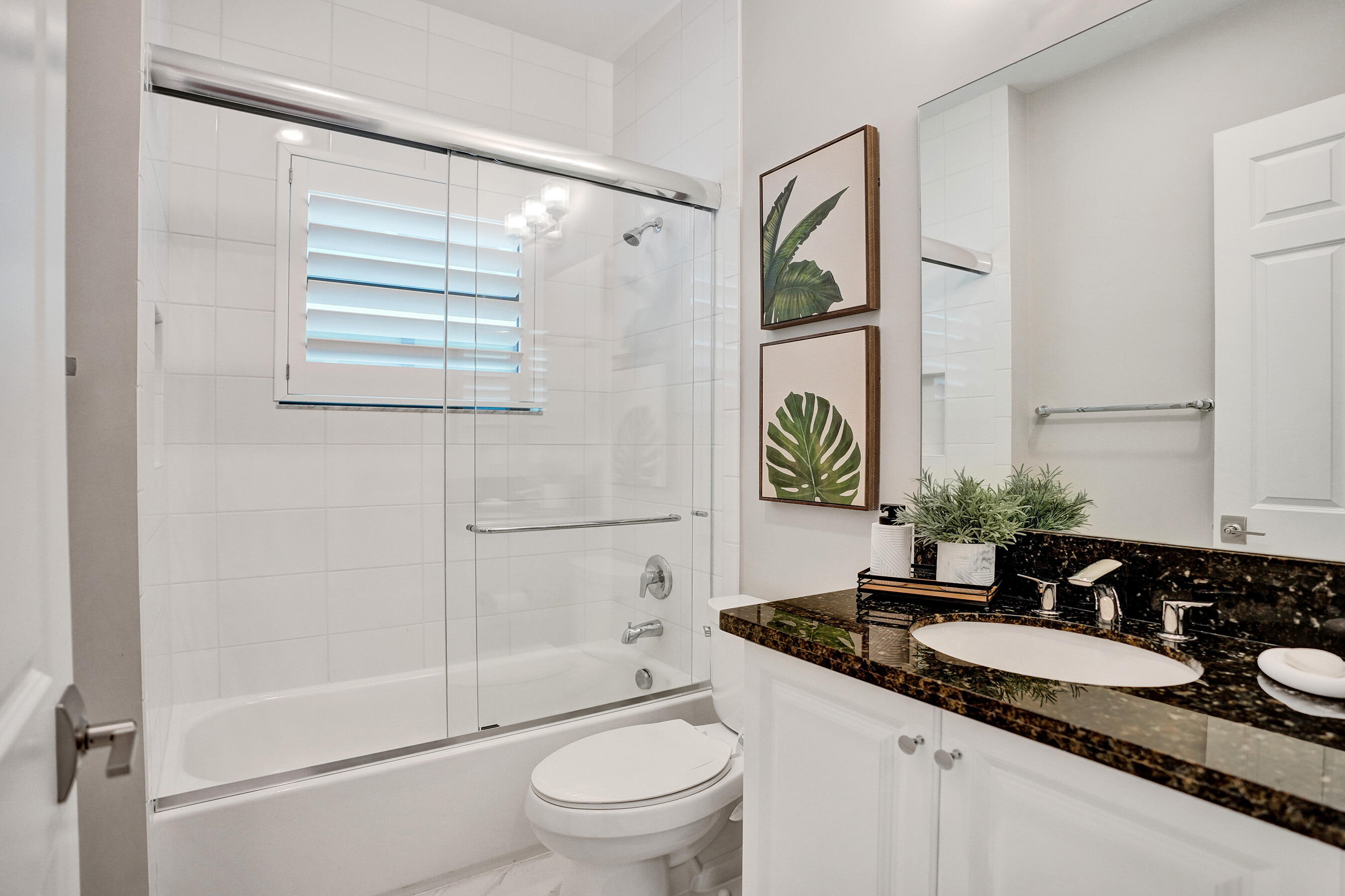9052 Chauvet Way Boca Raton, FL 33496 - Photo 52 of 59 a bathroom with a granite countertop sink toilet and shower