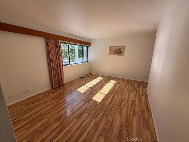 a kitchen with a stove and a sink