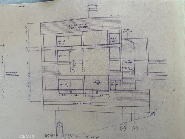a kitchen with a stove and a refrigerator