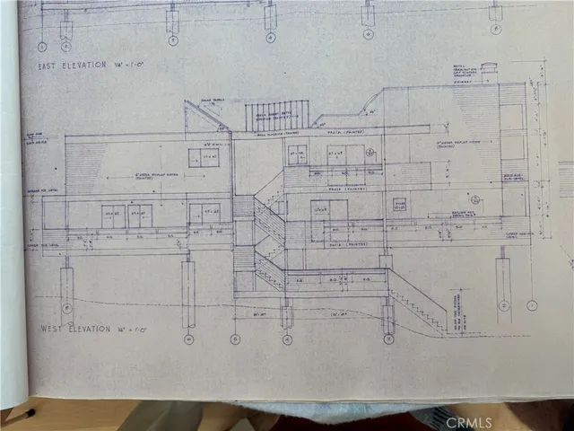 a room with a mirror and a wooden floor