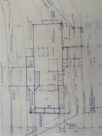a view of a kitchen with a sink stove refrigerator and windows
