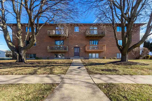a house with trees in front of it