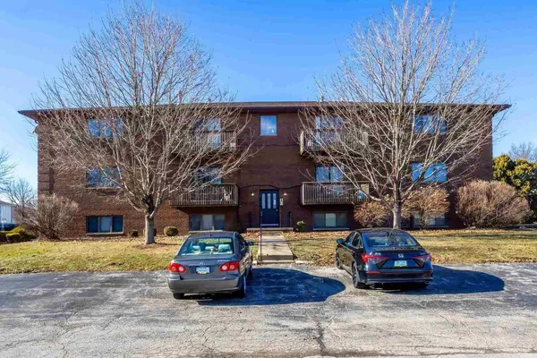 a car parked in front of a house