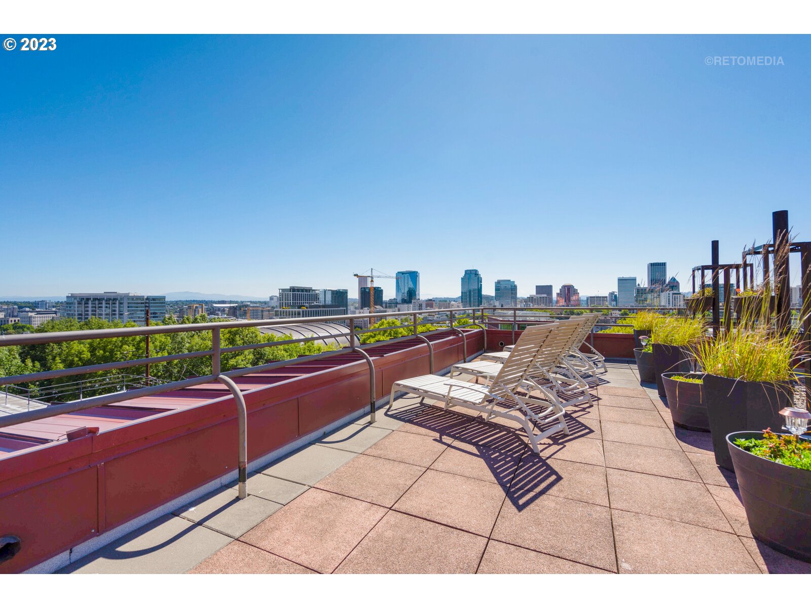 2021 Southwest Main Street, Unit 32 Portland, OR 97205 - Photo 31 of 38 a view of swimming pool with outdoor seating and a shower