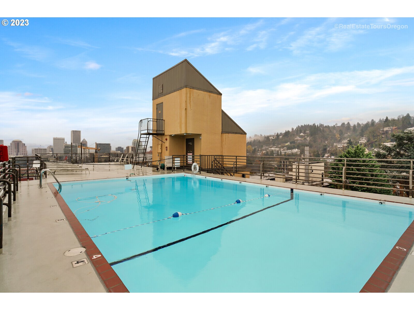 2021 Southwest Main Street, Unit 32 Portland, OR 97205 - Photo 33 of 38 a view of a kitchen with a sink and cabinets