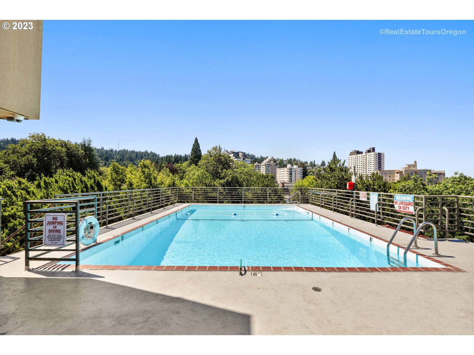 2021 Southwest Main Street, Unit 32 Portland, OR 97205 - Photo 34 of 38 a view of a tennis court