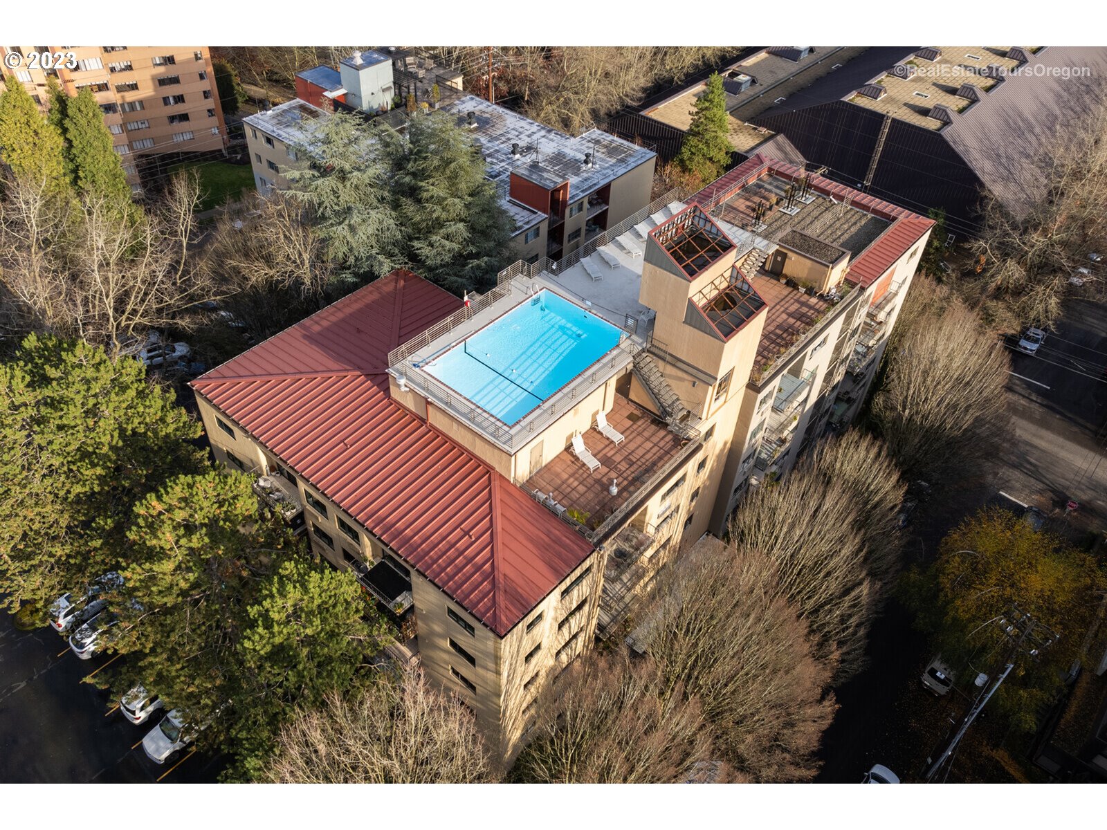 2021 Southwest Main Street, Unit 32 Portland, OR 97205 - Photo 35 of 38 a view of a house with a backyard