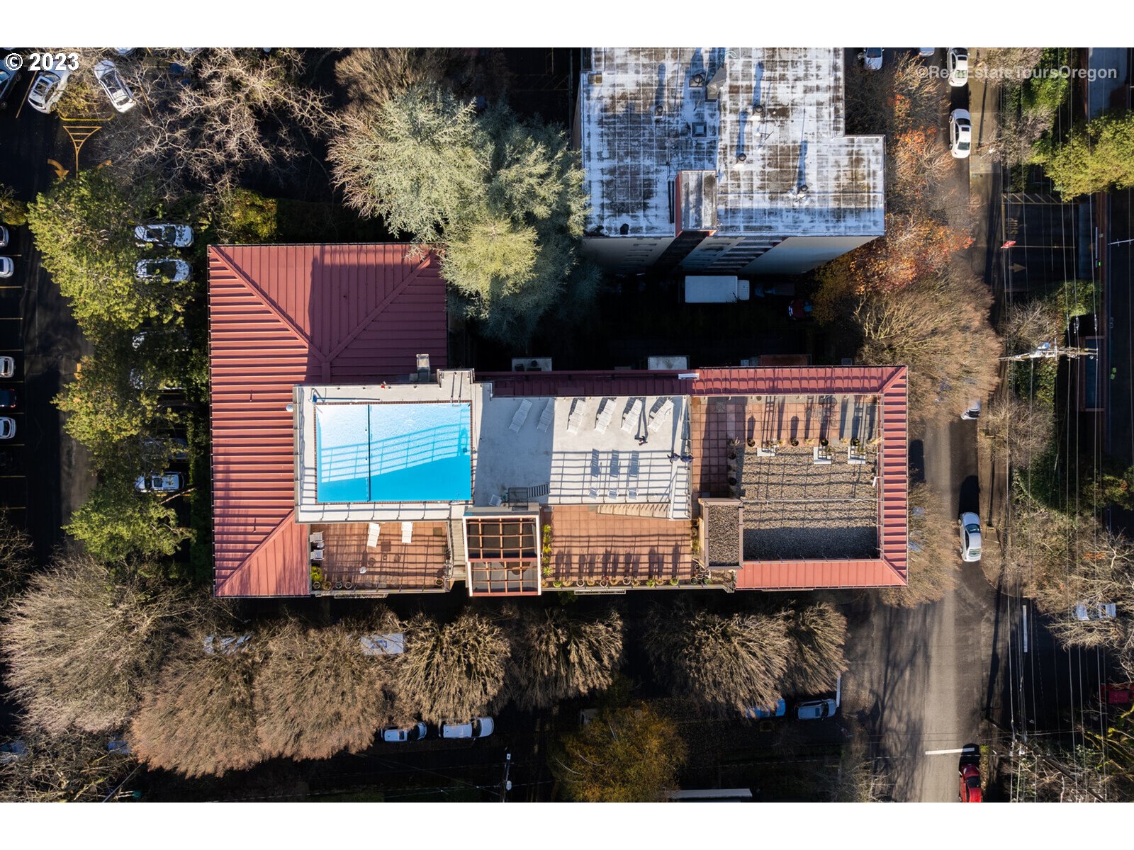 2021 Southwest Main Street, Unit 32 Portland, OR 97205 - Photo 38 of 38 a view of front of house with a yard