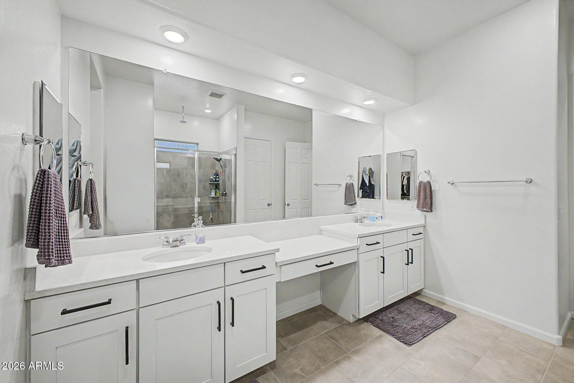 6511 West Steed Ridge Phoenix, AZ 85083 - Photo 16 of 41 a large bathroom with a double vanity sink mirror and double