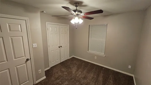 a view of a small space with a fan