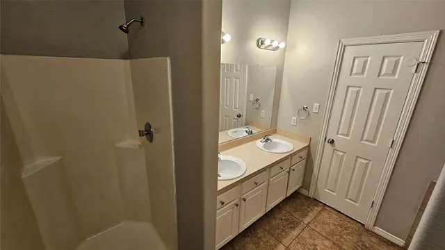 a white toilet sitting next to a small tub