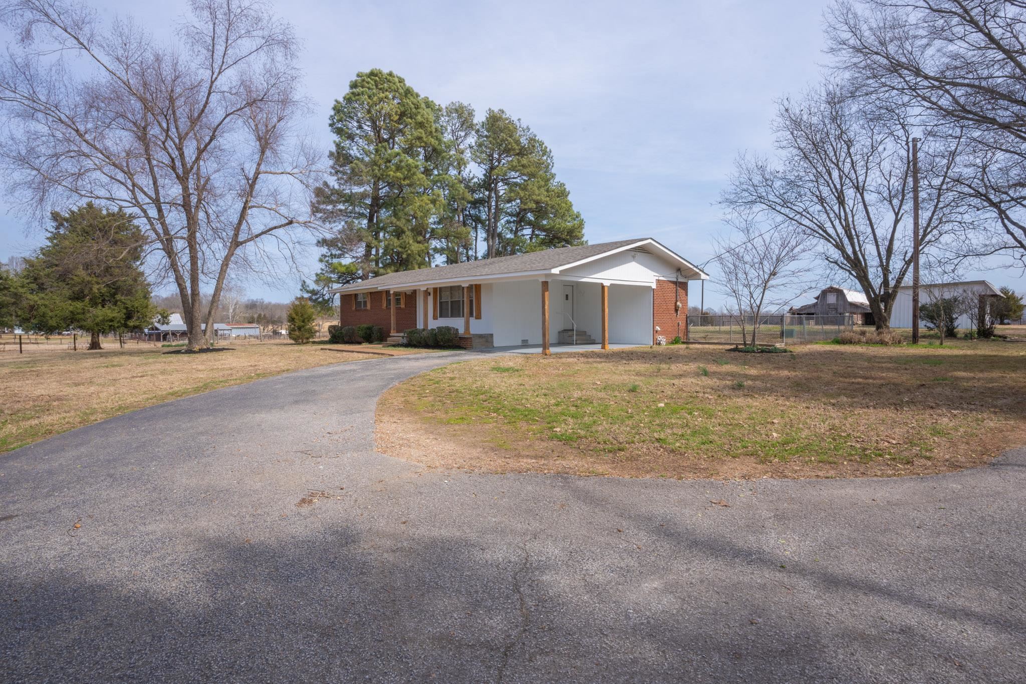 3616 Jack Pond Road Mason, TN 38049 - Photo 2 of 23 a view of a yard in front of a house