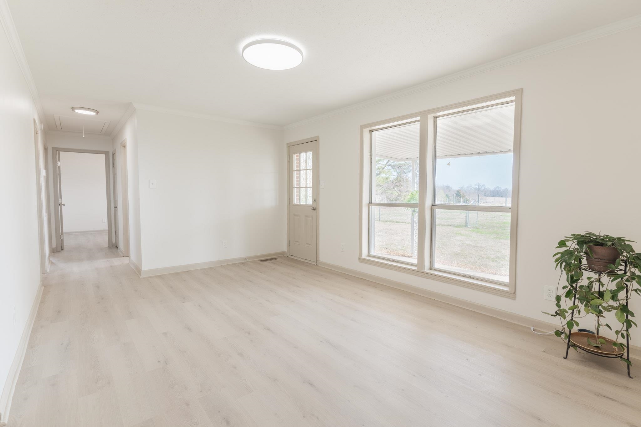 3616 Jack Pond Road Mason, TN 38049 - Photo 5 of 23 a view of an empty room with a window