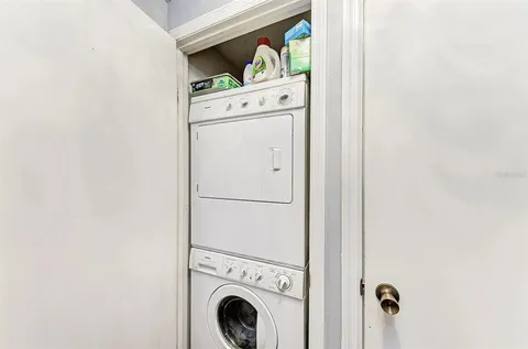 a view of a patio with a table and chairs in patio