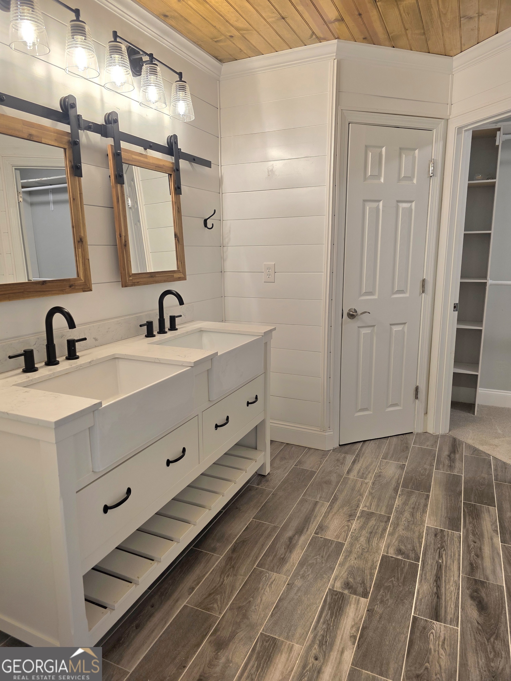 391 Price Street Statham, GA 30666 - Photo 20 of 41 a bathroom with a sink and a mirror