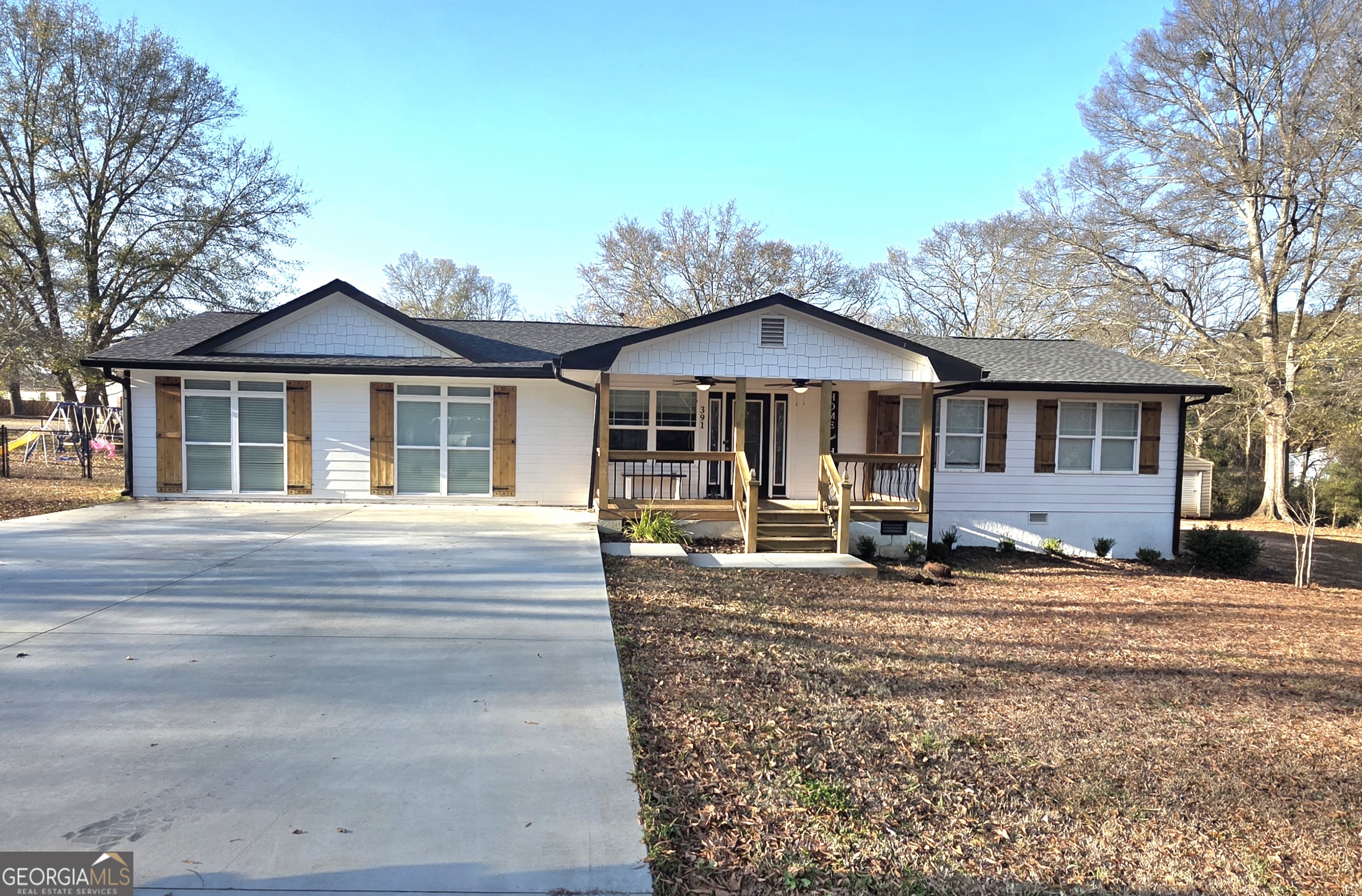 391 Price Street Statham, GA 30666 - Photo 2 of 41 a front view of a house with a yard