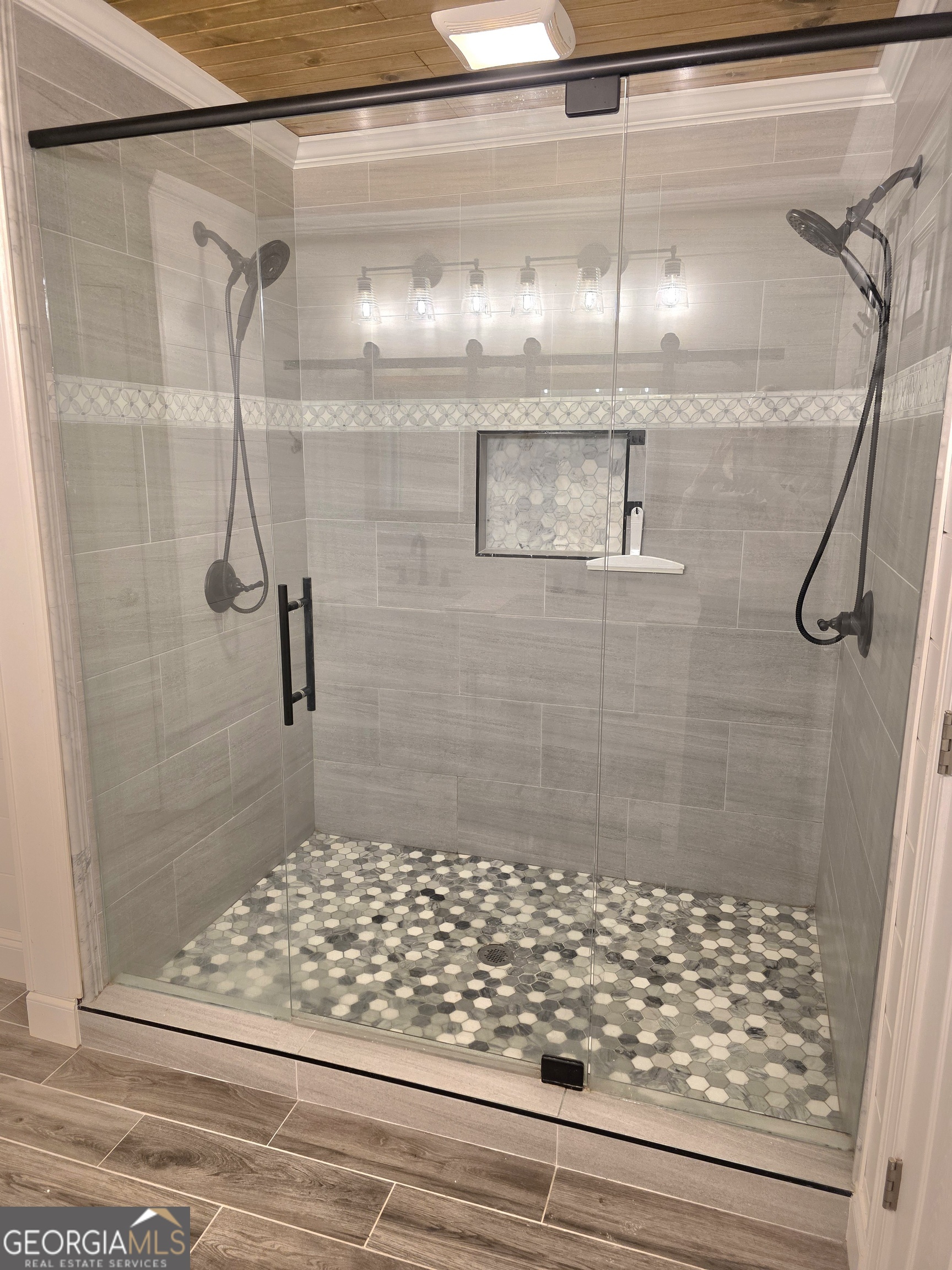 391 Price Street Statham, GA 30666 - Photo 23 of 41 a bathroom with a shower