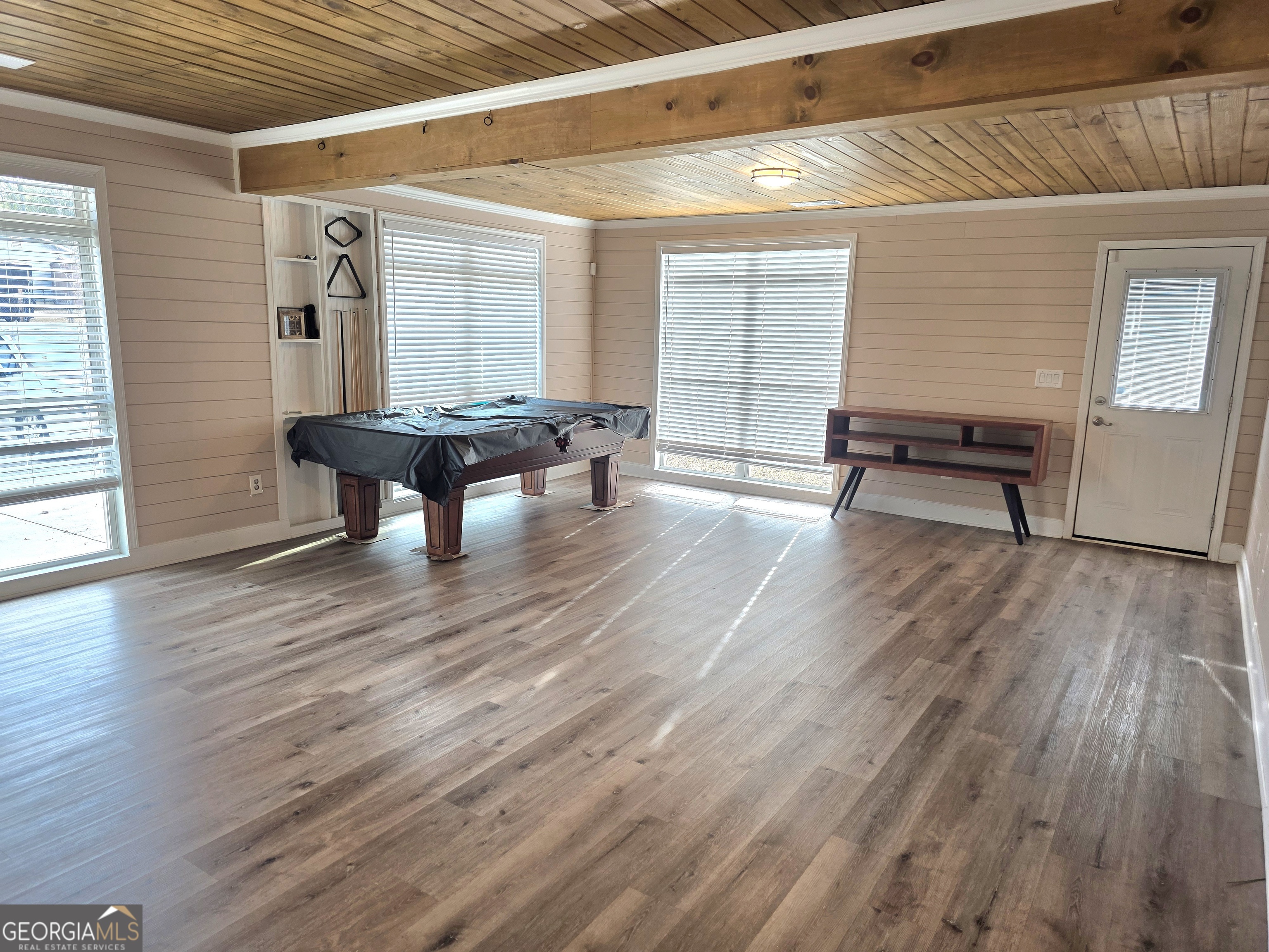 391 Price Street Statham, GA 30666 - Photo 34 of 41 a view of a livingroom with wooden floor and furniture