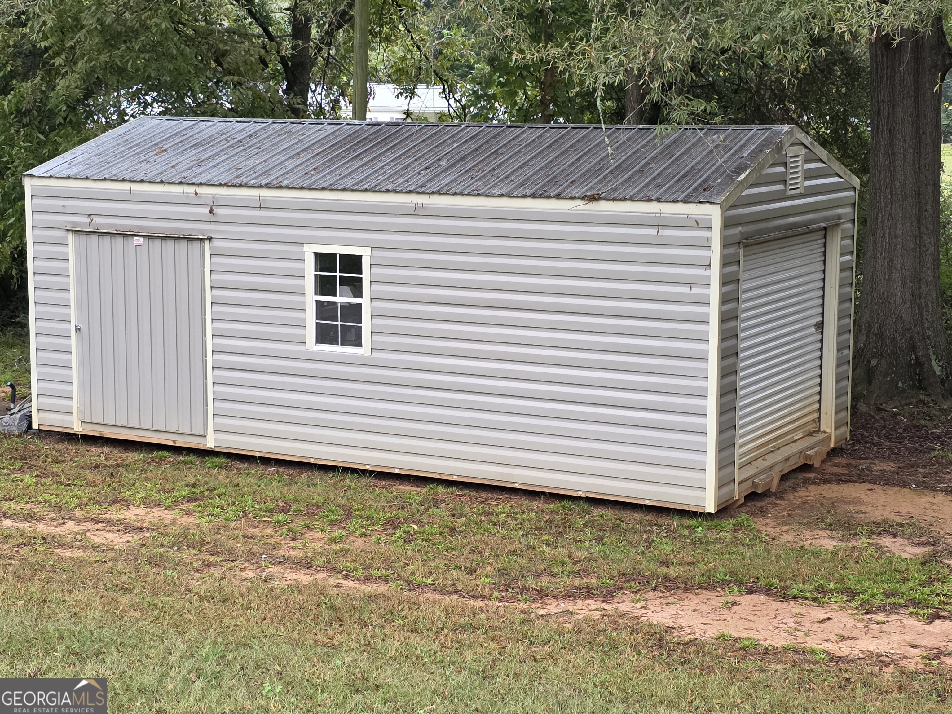 391 Price Street Statham, GA 30666 - Photo 38 of 41 a house view with a backyard space
