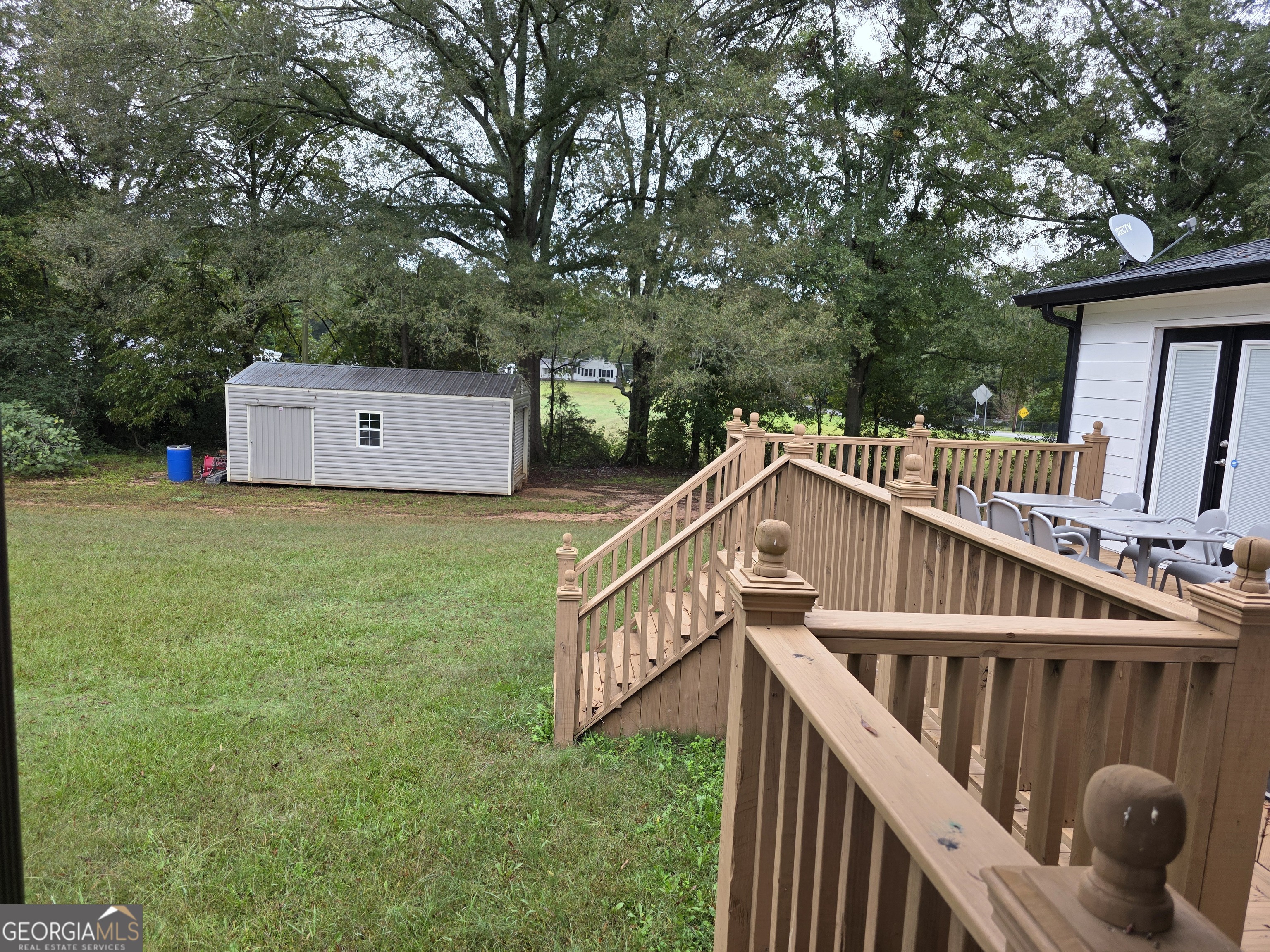 391 Price Street Statham, GA 30666 - Photo 40 of 41 a view of balcony with deck and trees